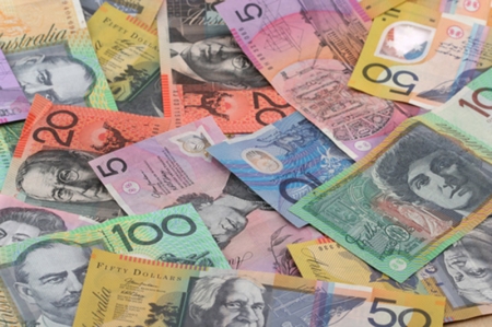 AUD/USD eases from one-week top, holds above 0.7100 mark amid weaker USD